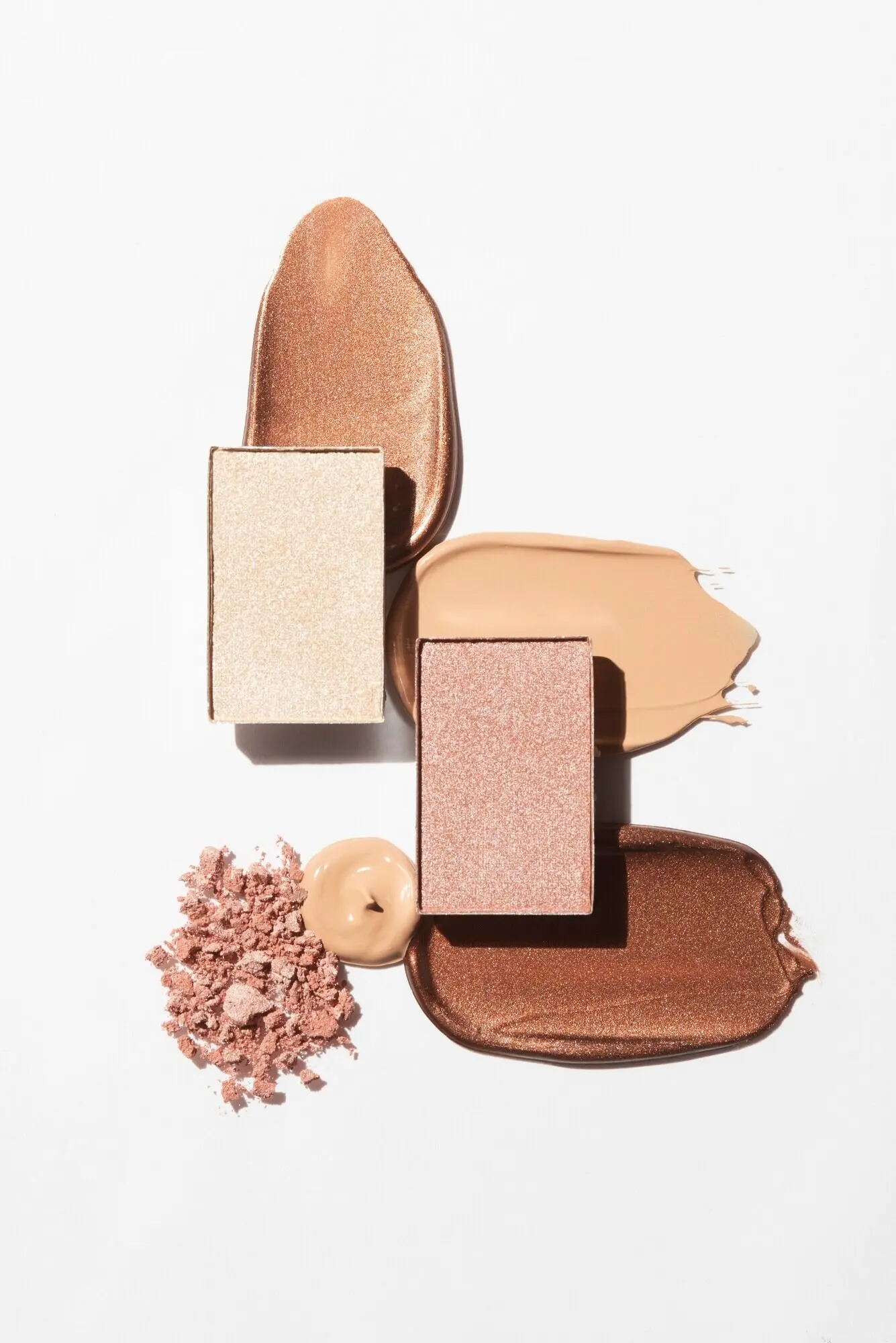 A still life featuring makeup textures.