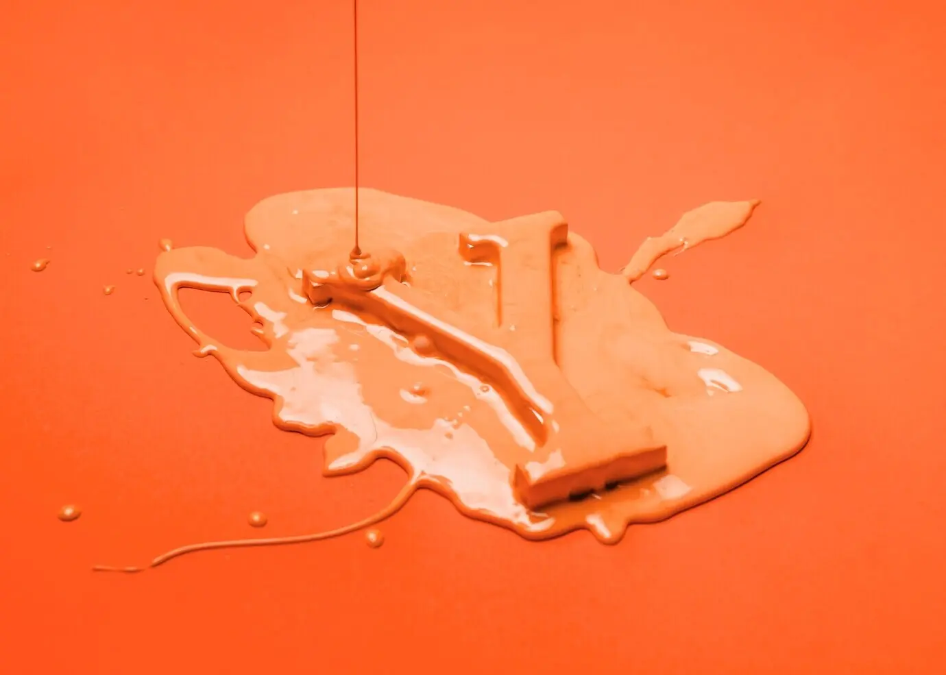 Paint dripping on the letter y.
